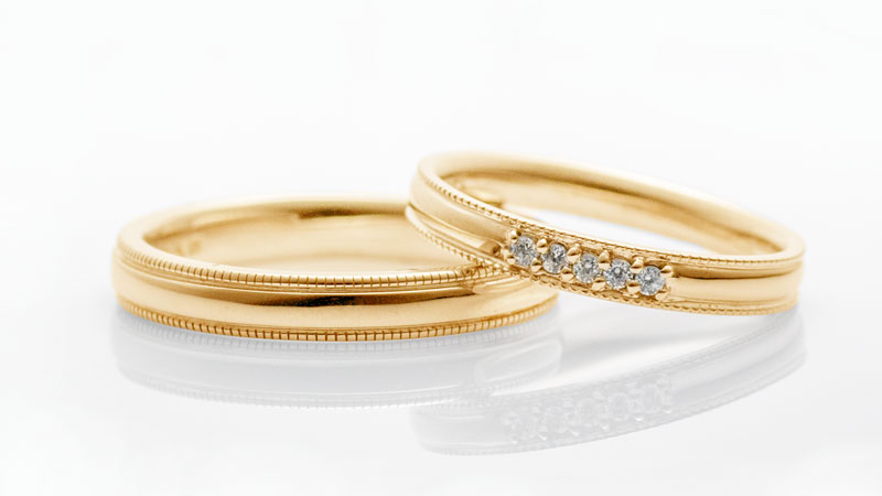 ミルデザインの18金の結婚指輪「キンモクセイ」